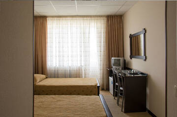 Стандартный двухместный номер с 1 кроватью или 2 отдельными кроватями в Гостинице Россия